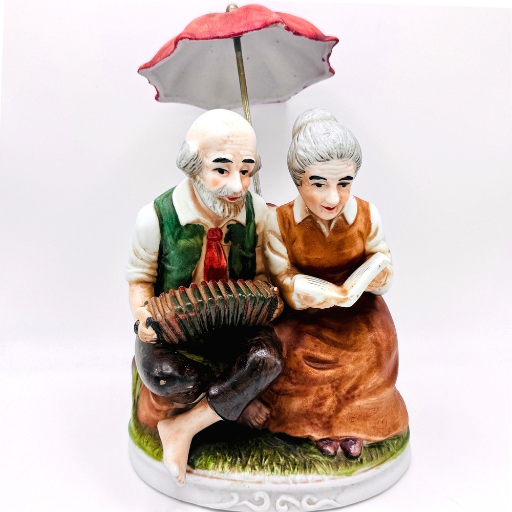 Vintage Porcelain Elderly Couple Figurine Umbrella Accordion Reading Music‎